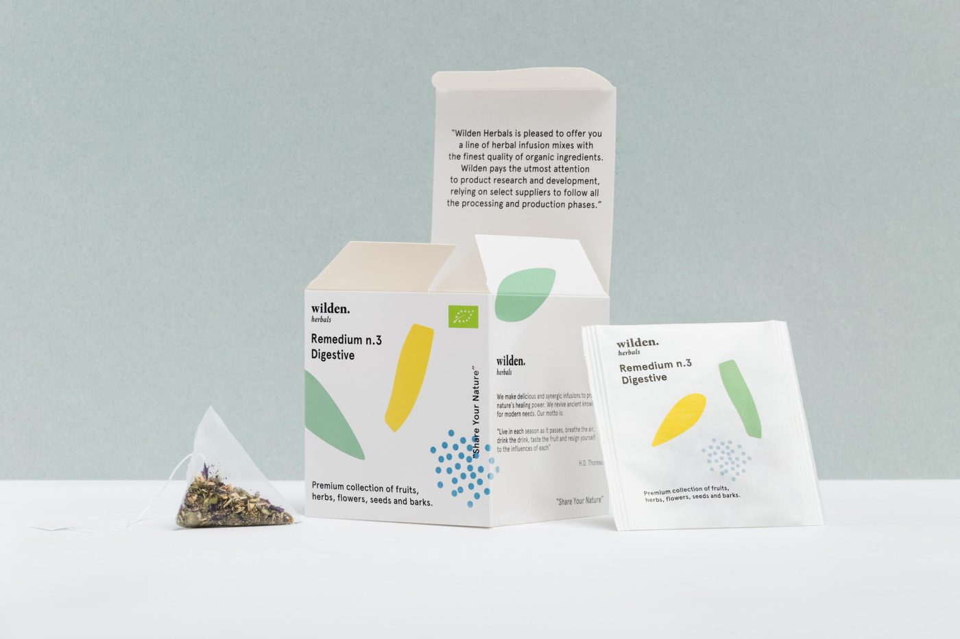 Square open package of herbal infusion Remedium Digestive with single tea bag and herbs